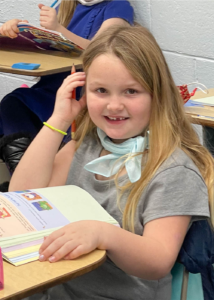 Student smiling in class